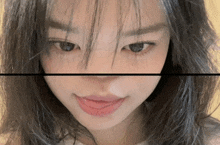 a close up of a woman 's face with a black line between her eyes and mouth