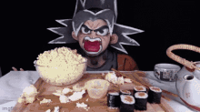 a person in a dragon ball costume is sitting at a table eating sushi