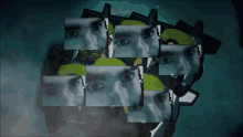 a collage of images of a man 's face is displayed in a dark room