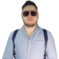 a man wearing suspenders and sunglasses looks serious