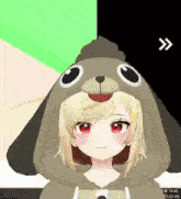 a girl is wearing a hoodie that looks like a dog 's head