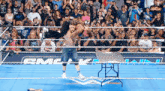 a man in a wrestling ring with the word smackdown on the side