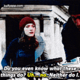 a man and a woman are standing next to each other and the woman is saying do you even know what these things do ?