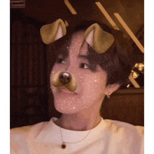 a man wearing a dog mask on his face looks at the camera