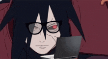 a cartoon character is wearing glasses and looking at a laptop computer .