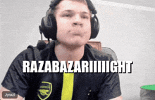 a man wearing headphones and a black shirt says razabazariiiight