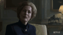 Looking Down Margaret Thatcher GIF - Looking Down Margaret Thatcher Gillian Anderson GIFs