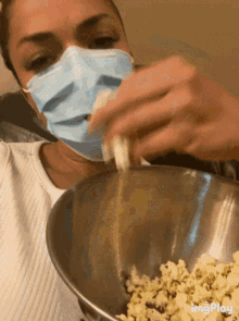 Mask Eating GIF - Mask Eating Popcorn GIFs