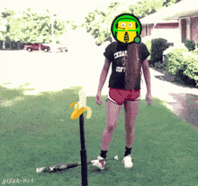 a girl wearing a cedar soft shirt stands next to a bat