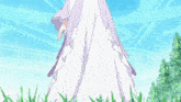 a woman in a white dress is standing in front of a blue background