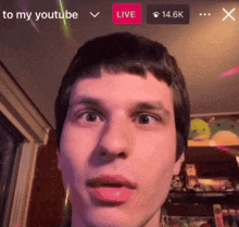 a close up of a man 's face with the words " to my youtube " on the bottom