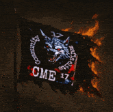 a black flag with a wolf and the words cme 17 on it