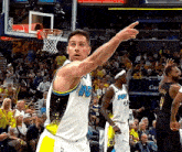 a basketball player wearing a white jersey with the number 43 on it