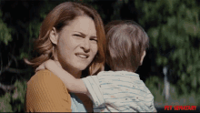 Holding To Child Taken A Back GIF - Holding To Child Taken A Back Shocked GIFs