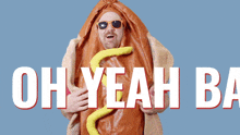 a man in a hot dog costume is holding a sandwich and says " h baby yeah "