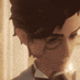 a close up of a person wearing glasses and a suit and tie .