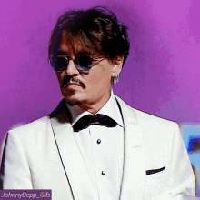 johnny depp deauville2019 waiting for the barbarians sunglasses suit