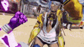 a girl in a yellow jacket is holding a purple fist .