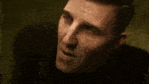 a man with his eyes closed and his mouth open