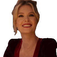 a close up of a woman 's face smiling