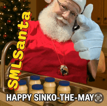 a picture of santa talking on a phone with the caption happy sinko the may