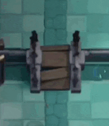 a clock is hanging from a chain in a video game .