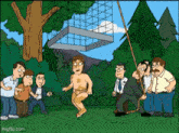 a group of men are standing around a man in a bathing suit .