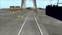 a computer generated image of a bridge over a body of water with boxes on the ground