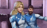 a man and a woman are standing next to each other and the woman is wearing a blue and white suit