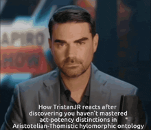 a man in a suit is talking about aristotelian-thomistic hylomorphic ontology