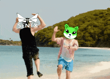two people on a beach with the word sentx on the top