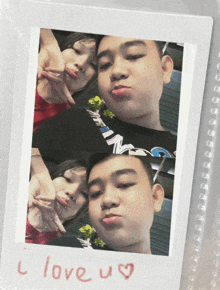 a polaroid picture of a boy and a girl with the words i love u written on the bottom