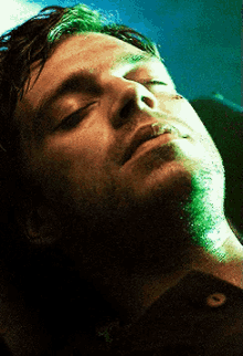 a close up of a man 's face in a pixelated image