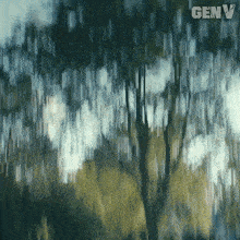 a blurry picture of trees with the word genv in the upper right corner