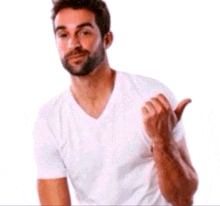 a man with a beard wearing a white shirt is giving a thumbs up .
