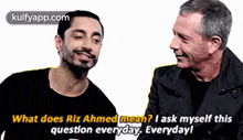two men are talking to each other and one of them is asking what does riz ahmed mean ?