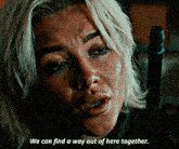 a close up of a woman with the words we can find a way out of here together