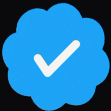 a blue circle with a white check mark inside of it