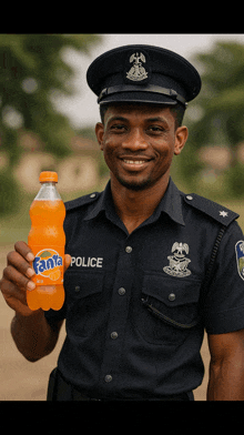 a police officer holds up a bottle of fanta orange soda