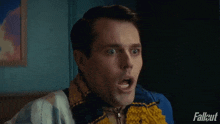 a man with a surprised look on his face is in a fallout ad