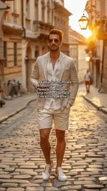 a man in a suit and shorts walks down a cobblestone street with a caption that says o saptamana frumoasa