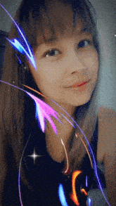 a woman 's face is surrounded by colorful lights and a star