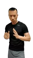 a man in a black shirt with a li ning logo on it