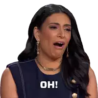 a woman wearing a dior necklace and earrings says " oh "