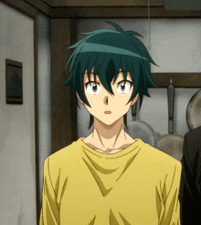a boy with green hair and a yellow shirt