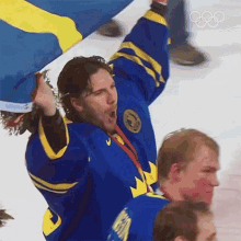 waving a flag ice hockey henrik lundqvist sweden olympics