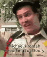 michael proctah is reporting for doofy and is wearing a hat and tie