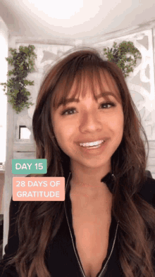 a woman is smiling with the words day 15 28 days of gratitude above her