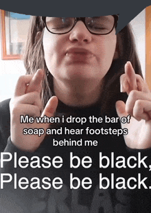 a woman with glasses and a caption that says please be black please be black