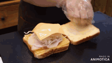 a sandwich is being made in an animatica advertisement